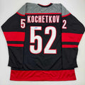 Autographed/Signed Pyotr Kochetkov Carolina Black Hockey Jersey JSA COA product image 1, provided for visual reference and