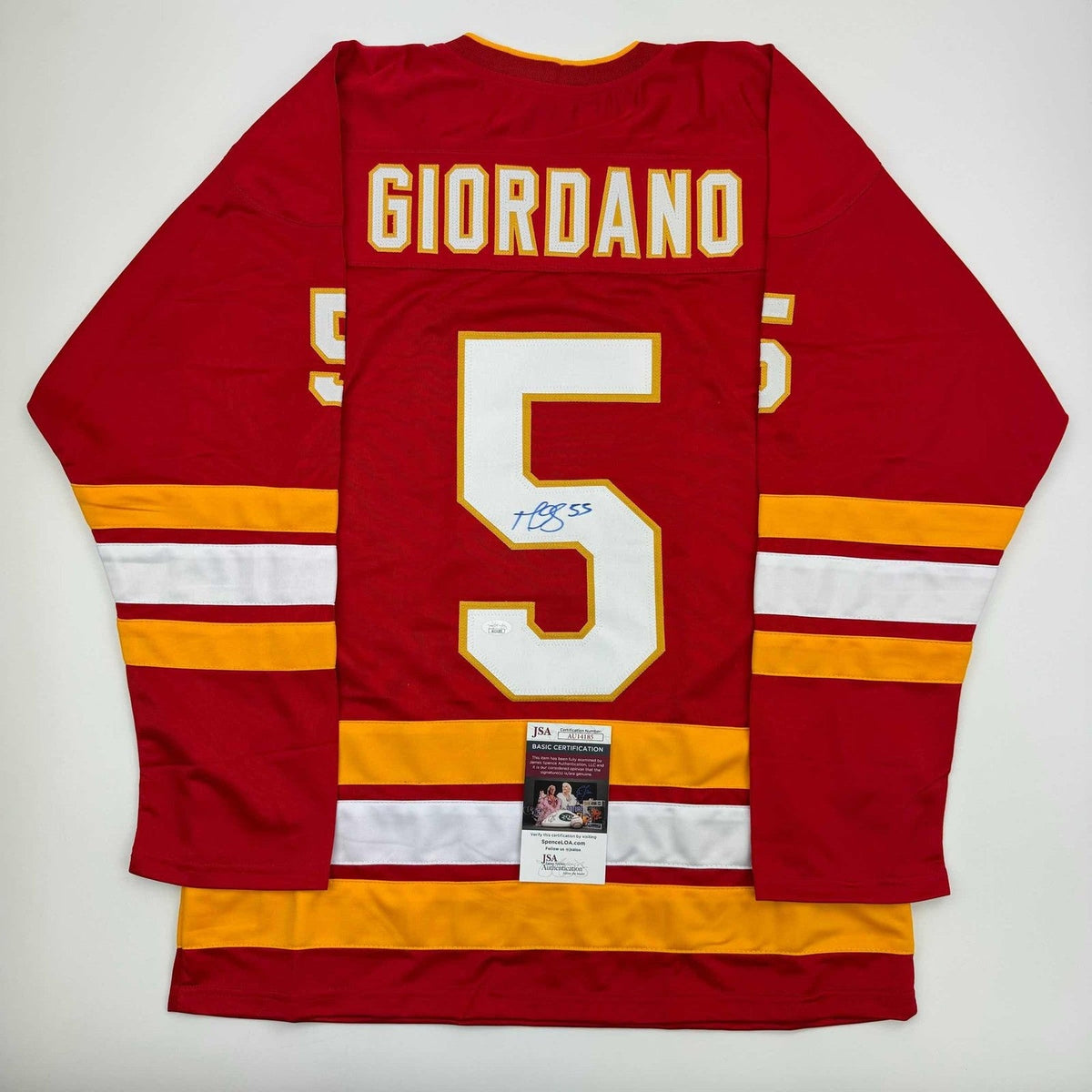 Autographed/Signed Mark Giordano Calgary Red Hockey Jersey JSA COA product image 1, provided for visual reference and